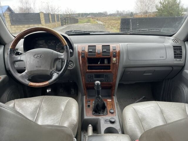 Синий Хендай Терракан, объемом двигателя 2.5 л и пробегом 330 тыс. км за 2000 $, фото 7 на Automoto.ua