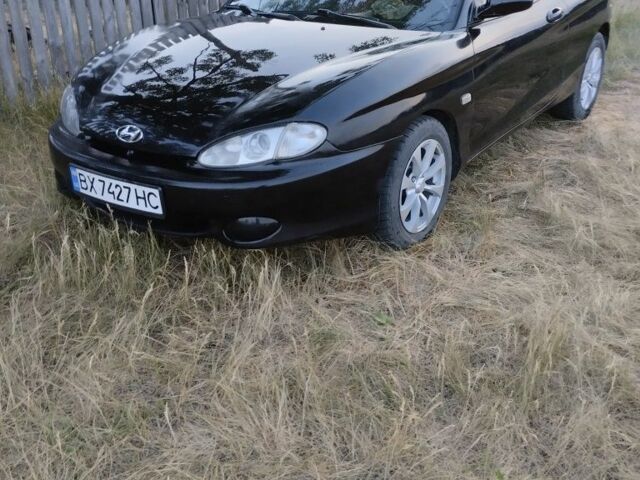 Черный Хендай Тибурон, объемом двигателя 2 л и пробегом 300 тыс. км за 2950 $, фото 2 на Automoto.ua