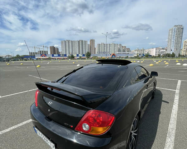 Черный Хендай Тибурон, объемом двигателя 2.7 л и пробегом 67 тыс. км за 6000 $, фото 24 на Automoto.ua