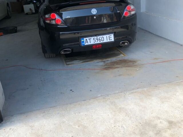 Чорний Хендай Тібурон, об'ємом двигуна 2.7 л та пробігом 300 тис. км за 7000 $, фото 6 на Automoto.ua