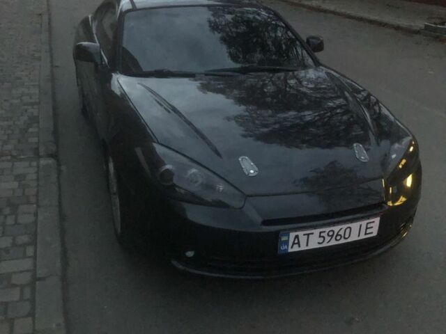 Чорний Хендай Тібурон, об'ємом двигуна 2.7 л та пробігом 300 тис. км за 7000 $, фото 8 на Automoto.ua