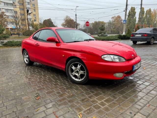 Красный Хендай Тибурон, объемом двигателя 2 л и пробегом 200 тыс. км за 2999 $, фото 7 на Automoto.ua