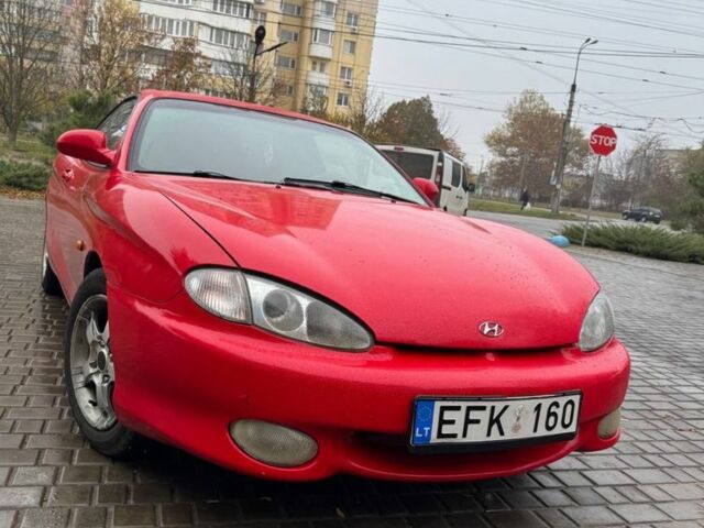 Красный Хендай Тибурон, объемом двигателя 2 л и пробегом 200 тыс. км за 2999 $, фото 9 на Automoto.ua