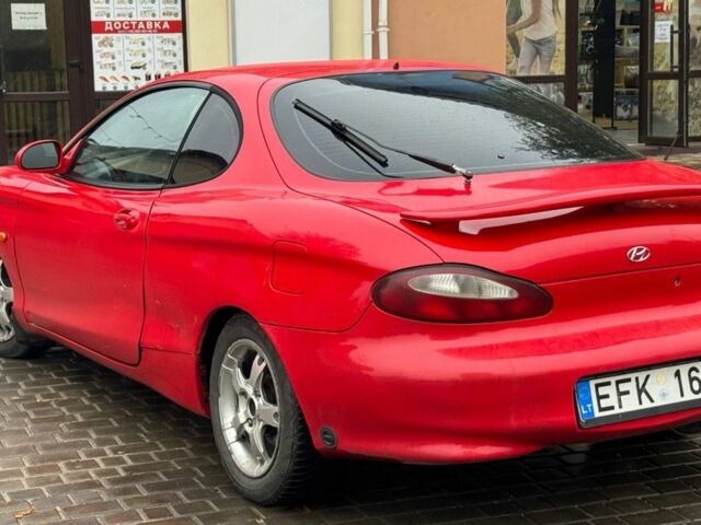 Красный Хендай Тибурон, объемом двигателя 2 л и пробегом 200 тыс. км за 2999 $, фото 5 на Automoto.ua