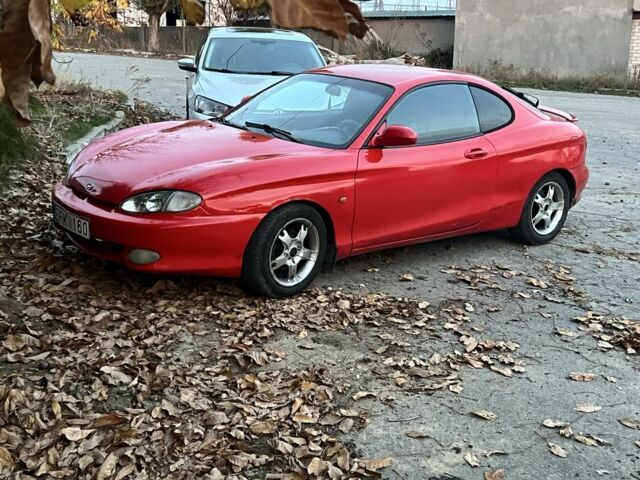 Красный Хендай Тибурон, объемом двигателя 2 л и пробегом 200 тыс. км за 2999 $, фото 10 на Automoto.ua