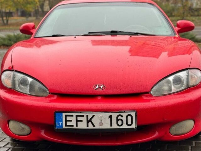 Красный Хендай Тибурон, объемом двигателя 2 л и пробегом 200 тыс. км за 2999 $, фото 1 на Automoto.ua