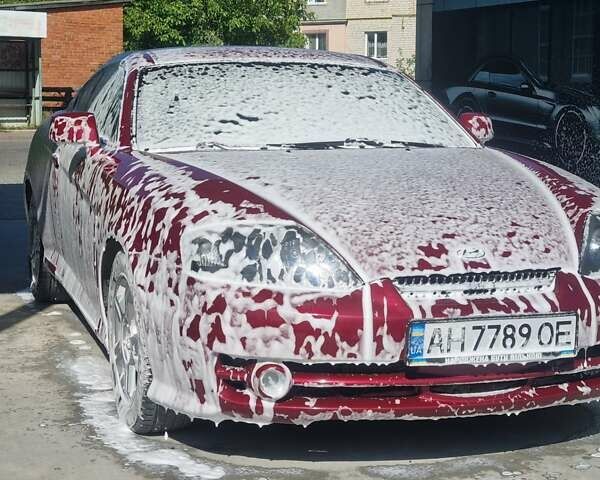 Красный Хендай Тибурон, объемом двигателя 2 л и пробегом 238 тыс. км за 4100 $, фото 20 на Automoto.ua