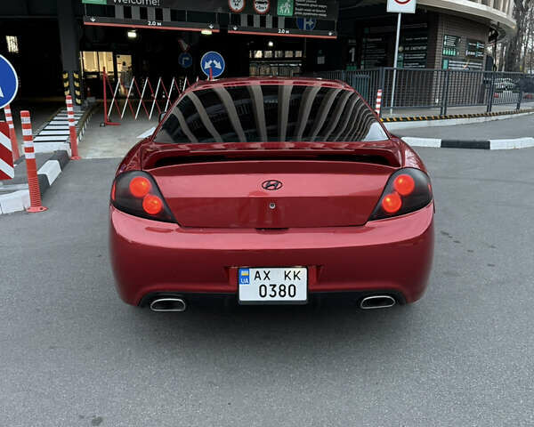 Красный Хендай Тибурон, объемом двигателя 1.98 л и пробегом 240 тыс. км за 5800 $, фото 1 на Automoto.ua