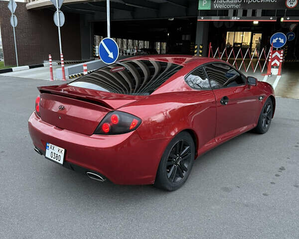 Красный Хендай Тибурон, объемом двигателя 1.98 л и пробегом 240 тыс. км за 5800 $, фото 2 на Automoto.ua