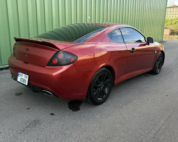 Красный Хендай Тибурон, объемом двигателя 1.98 л и пробегом 240 тыс. км за 5800 $, фото 8 на Automoto.ua