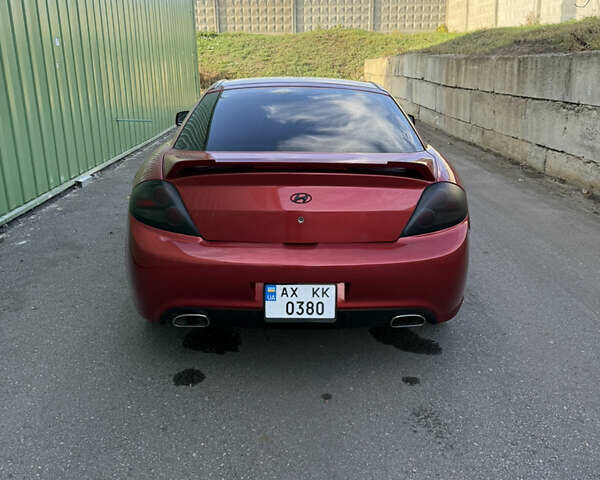 Красный Хендай Тибурон, объемом двигателя 1.98 л и пробегом 240 тыс. км за 5800 $, фото 16 на Automoto.ua