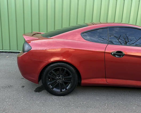 Красный Хендай Тибурон, объемом двигателя 1.98 л и пробегом 240 тыс. км за 5800 $, фото 9 на Automoto.ua