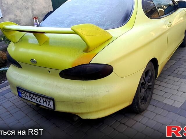 Хендай Тибурон, объемом двигателя 2 л и пробегом 275 тыс. км за 2700 $, фото 5 на Automoto.ua