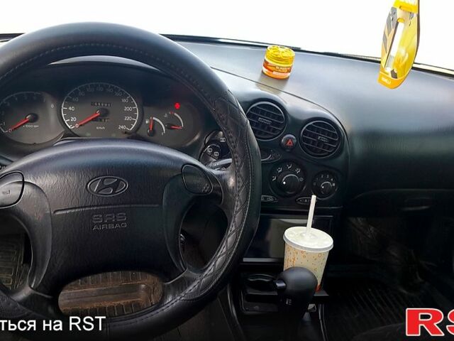 Хендай Тибурон, объемом двигателя 2 л и пробегом 275 тыс. км за 2700 $, фото 1 на Automoto.ua