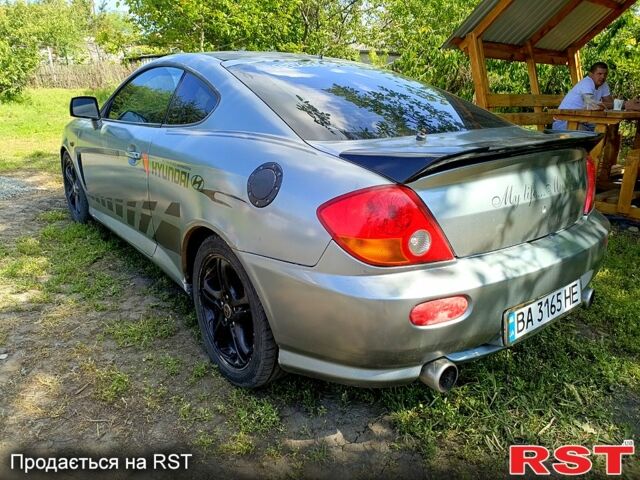 Серый Хендай Тибурон, объемом двигателя 2 л и пробегом 200 тыс. км за 3500 $, фото 3 на Automoto.ua