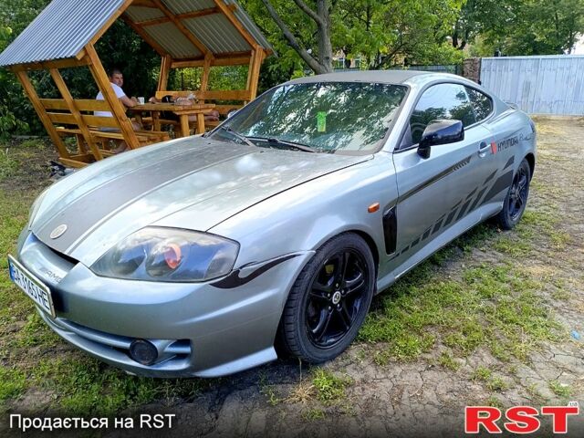 Серый Хендай Тибурон, объемом двигателя 2 л и пробегом 200 тыс. км за 3500 $, фото 2 на Automoto.ua