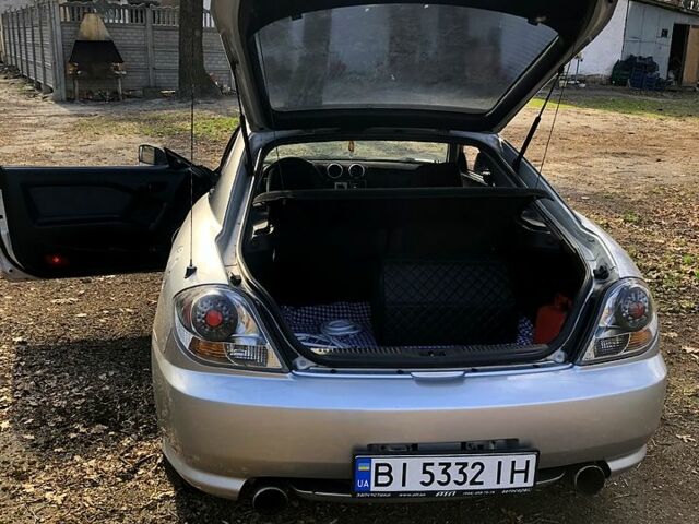 Серый Хендай Тибурон, объемом двигателя 2 л и пробегом 190 тыс. км за 4200 $, фото 12 на Automoto.ua