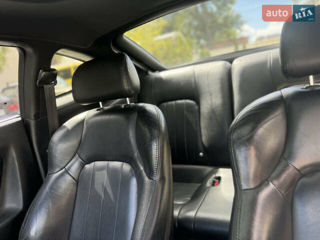 Серый Хендай Тибурон, объемом двигателя 1.98 л и пробегом 150 тыс. км за 4200 $, фото 10 на Automoto.ua