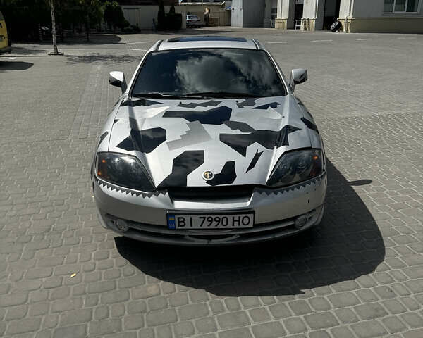 Серый Хендай Тибурон, объемом двигателя 1.98 л и пробегом 150 тыс. км за 4200 $, фото 1 на Automoto.ua