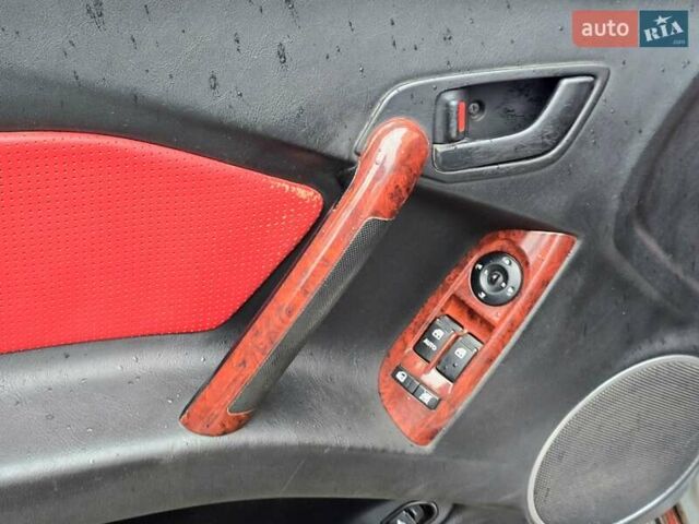 Серый Хендай Тибурон, объемом двигателя 2 л и пробегом 65 тыс. км за 3400 $, фото 10 на Automoto.ua