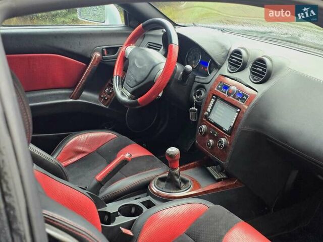 Серый Хендай Тибурон, объемом двигателя 2 л и пробегом 65 тыс. км за 3900 $, фото 15 на Automoto.ua