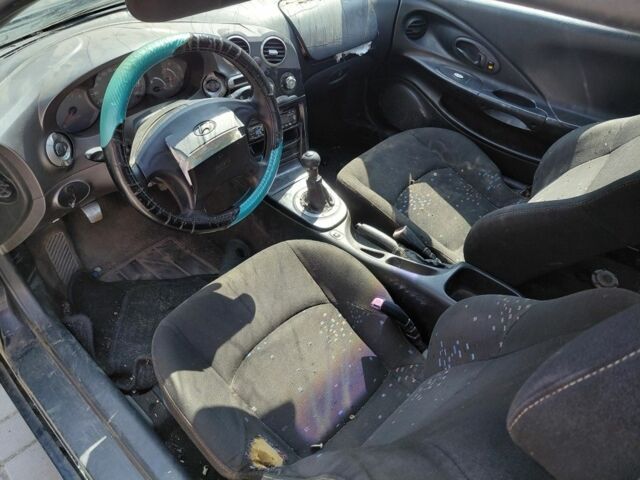 Синий Хендай Тибурон, объемом двигателя 1.6 л и пробегом 232 тыс. км за 650 $, фото 4 на Automoto.ua