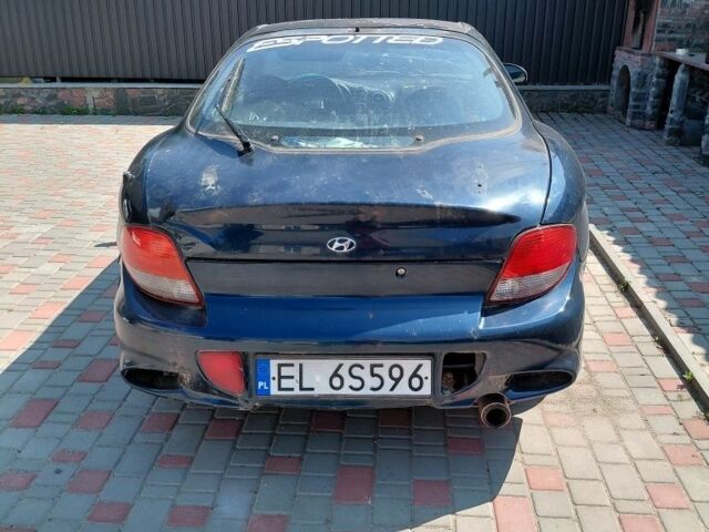 Синий Хендай Тибурон, объемом двигателя 1.6 л и пробегом 232 тыс. км за 650 $, фото 3 на Automoto.ua