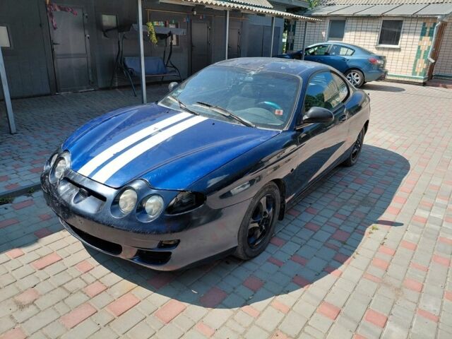 Синий Хендай Тибурон, объемом двигателя 1.6 л и пробегом 232 тыс. км за 650 $, фото 1 на Automoto.ua