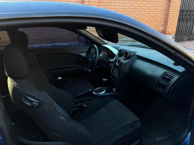 Синий Хендай Тибурон, объемом двигателя 2 л и пробегом 178 тыс. км за 2800 $, фото 5 на Automoto.ua