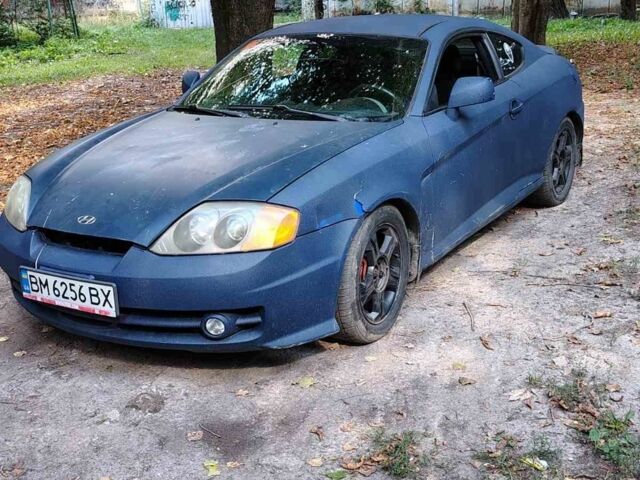 Синий Хендай Тибурон, объемом двигателя 2 л и пробегом 178 тыс. км за 2800 $, фото 1 на Automoto.ua