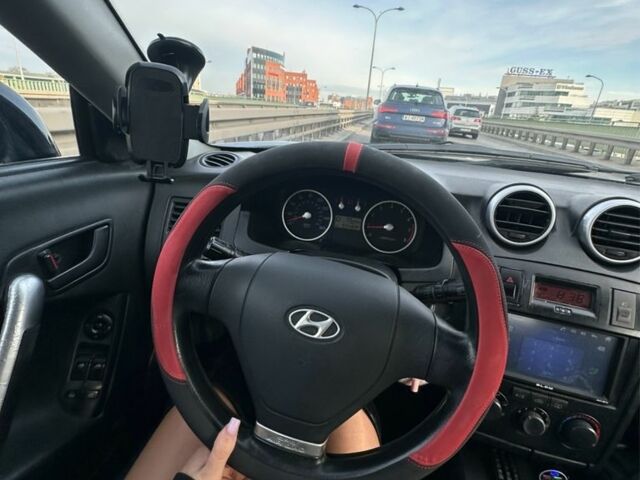 Синий Хендай Тибурон, объемом двигателя 2 л и пробегом 165 тыс. км за 6395 $, фото 2 на Automoto.ua