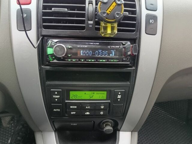 Синій Хендай Тібурон, об'ємом двигуна 2 л та пробігом 300 тис. км за 6700 $, фото 6 на Automoto.ua