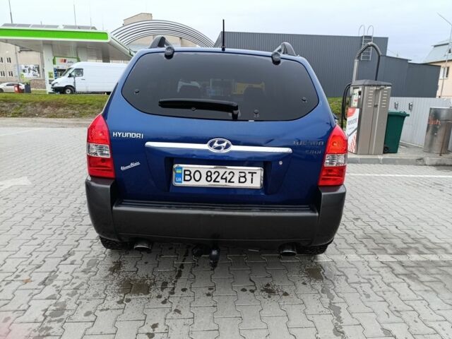 Синій Хендай Тібурон, об'ємом двигуна 2 л та пробігом 300 тис. км за 6700 $, фото 2 на Automoto.ua