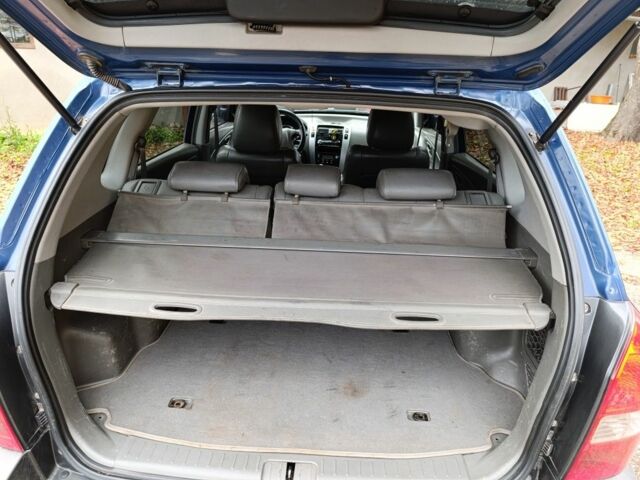 Синій Хендай Тібурон, об'ємом двигуна 2 л та пробігом 300 тис. км за 6700 $, фото 5 на Automoto.ua