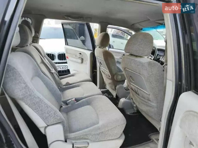 Чорний Хендай Траджет, об'ємом двигуна 2 л та пробігом 217 тис. км за 4600 $, фото 11 на Automoto.ua