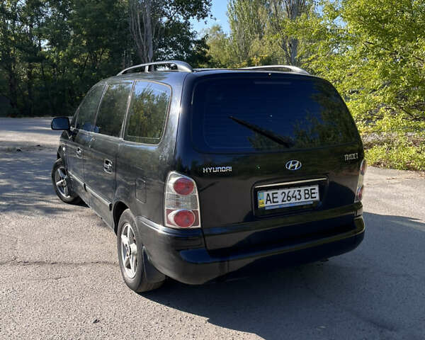 Чорний Хендай Траджет, об'ємом двигуна 2 л та пробігом 217 тис. км за 4600 $, фото 4 на Automoto.ua