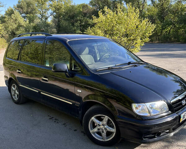 Чорний Хендай Траджет, об'ємом двигуна 2 л та пробігом 217 тис. км за 4600 $, фото 7 на Automoto.ua
