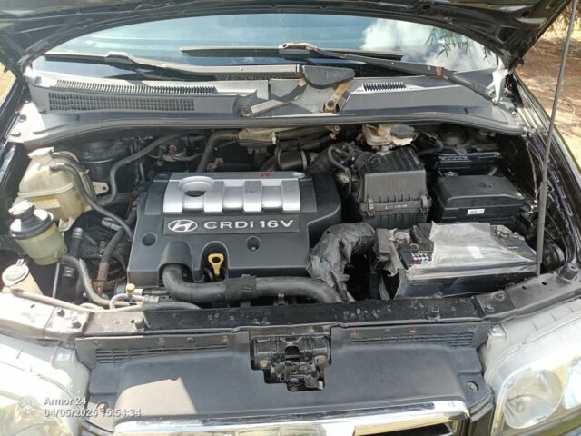 Черный Хендай Траджет, объемом двигателя 2 л и пробегом 350 тыс. км за 3500 $, фото 7 на Automoto.ua