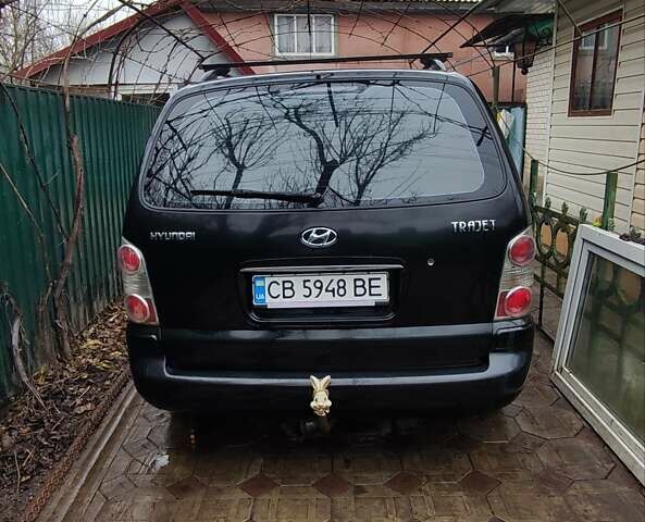 Черный Хендай Траджет, объемом двигателя 2 л и пробегом 297 тыс. км за 4500 $, фото 4 на Automoto.ua