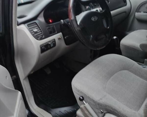 Черный Хендай Траджет, объемом двигателя 2 л и пробегом 297 тыс. км за 4500 $, фото 13 на Automoto.ua