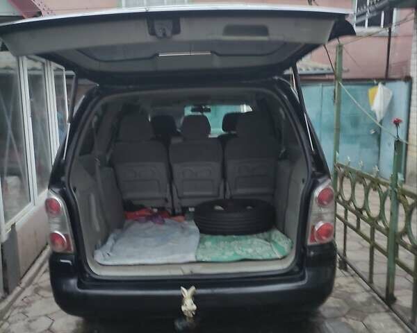 Черный Хендай Траджет, объемом двигателя 2 л и пробегом 297 тыс. км за 4500 $, фото 16 на Automoto.ua