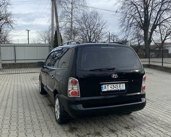 Черный Хендай Траджет, объемом двигателя 2.7 л и пробегом 320 тыс. км за 4500 $, фото 4 на Automoto.ua