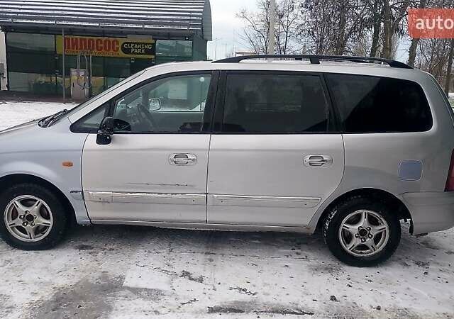 Сірий Хендай Траджет, об'ємом двигуна 2 л та пробігом 457 тис. км за 4500 $, фото 6 на Automoto.ua