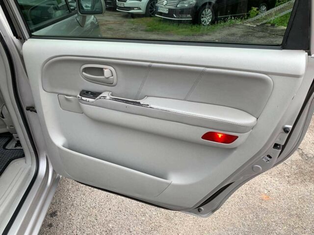 Сірий Хендай Траджет, об'ємом двигуна 2 л та пробігом 250 тис. км за 4740 $, фото 13 на Automoto.ua