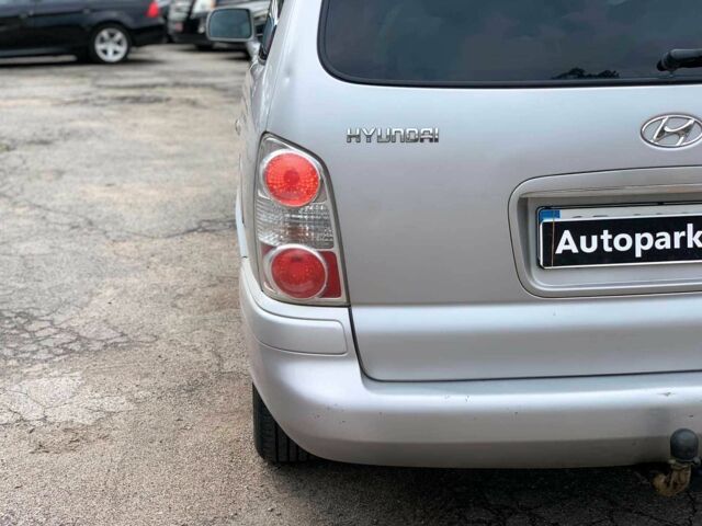 Сірий Хендай Траджет, об'ємом двигуна 2 л та пробігом 250 тис. км за 4740 $, фото 11 на Automoto.ua