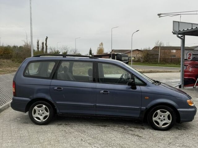 Синий Хендай Траджет, объемом двигателя 2 л и пробегом 300 тыс. км за 2100 $, фото 4 на Automoto.ua