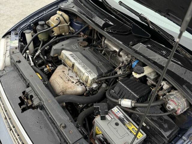 Синий Хендай Траджет, объемом двигателя 2 л и пробегом 300 тыс. км за 2100 $, фото 2 на Automoto.ua