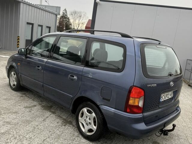 Синий Хендай Траджет, объемом двигателя 2 л и пробегом 300 тыс. км за 2100 $, фото 3 на Automoto.ua