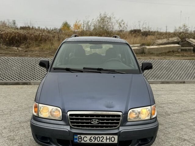 Синий Хендай Траджет, объемом двигателя 2 л и пробегом 300 тыс. км за 2100 $, фото 5 на Automoto.ua