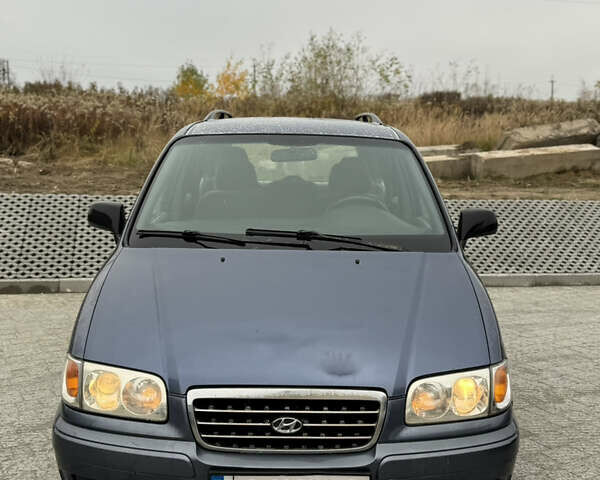 Синий Хендай Траджет, объемом двигателя 2 л и пробегом 300 тыс. км за 2100 $, фото 3 на Automoto.ua